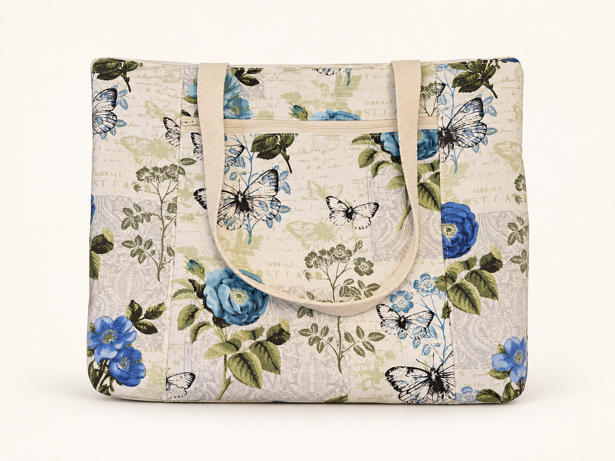 Life is Blue-tiful Floral Tote Bag on a cream studio background