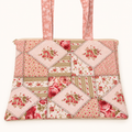 Pink Shabby Chic Laptop Sleeve on a cream studio background