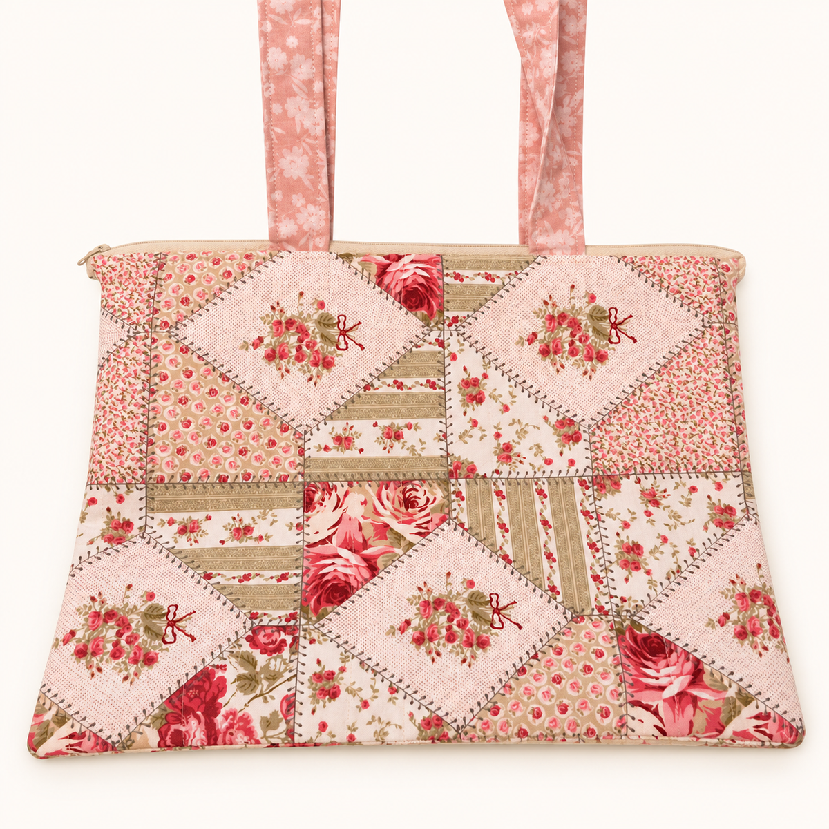 Pink Shabby Chic Laptop Sleeve on a cream studio background